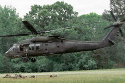 Soldiers assigned to the Military District of Washington board a UH-60 Black Hawk helicopter.
