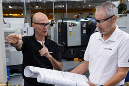 Greg Burns, Director of Operations, L3Harris Canoga Park Site (L) and Pat O’Kelley, L3Harris Canoga Park Site Lead (R), discuss expansion plans.