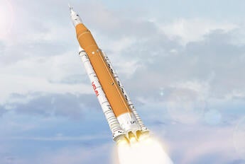 SLS rockets through clouds