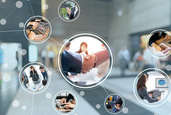 Network of people working and shaking hands
