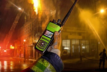 XL Extreme™ 400P portable two-way radio in firefighter's hand