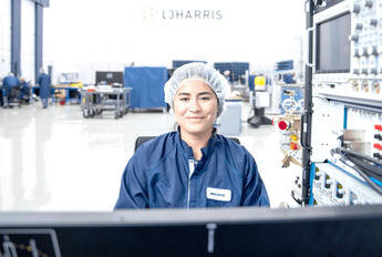 Woman in manufacturing facility