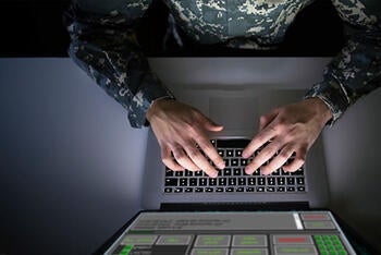 Soldier using Link 16 software tools