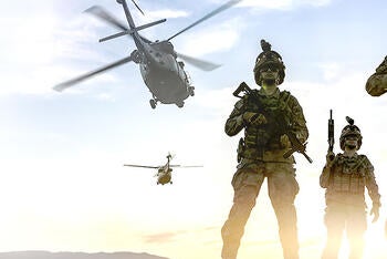 helicopters and soldiers with Small Tactical Terminal (STT) KOR-24A