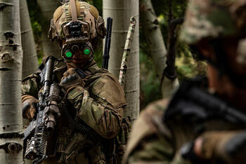 Soldier wears ENVGB goggles