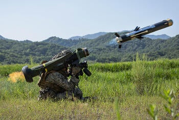 Soldier fires a Javelin missile