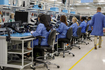 Employees work in laboratory