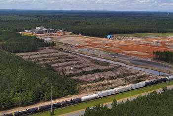 Construction crews continue work on expanding a facility in Arkansas