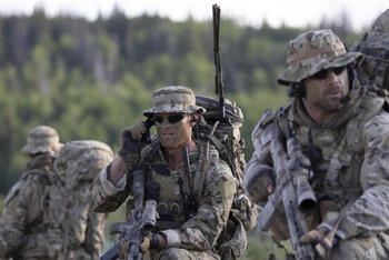 Soldiers using HF radio in the field