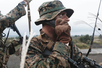 Soldiers using HF radio in the field