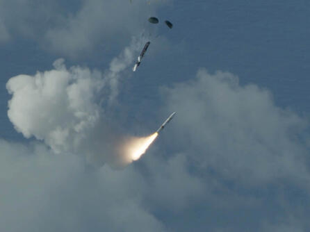 Missile flies through clouds