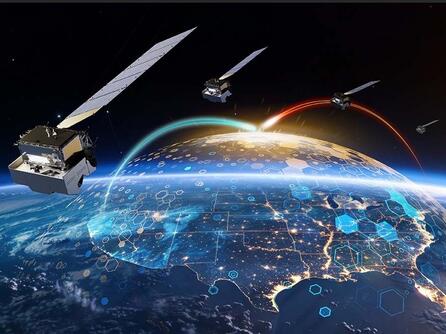 Satellites hover over earth with dome surrounding United States