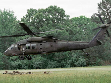 Soldiers assigned to the Military District of Washington board a UH-60 Black Hawk helicopter.