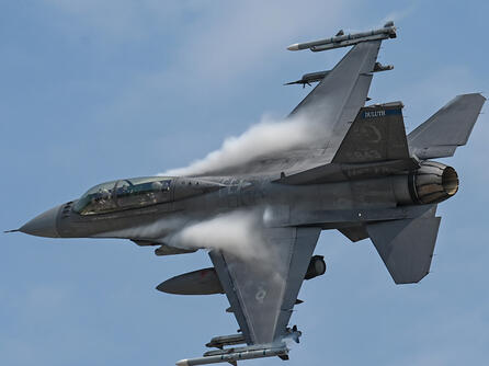 An F-16 Fighting Falcon with the Minnesota National Guard soars through the air above Duluth, Minn.