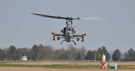 Helicopter lands at air field thumbnail image
