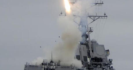 Tomahawk missile launched from destroyer U.S.S. Sterett during weapon test.