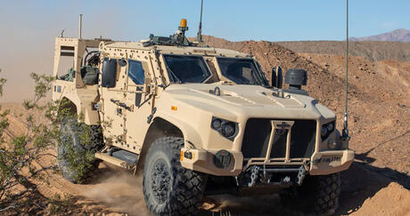 U.S. Soldiers maneuver a Joint Light Tactical Vehicle (JLTV). Thumbnail image.