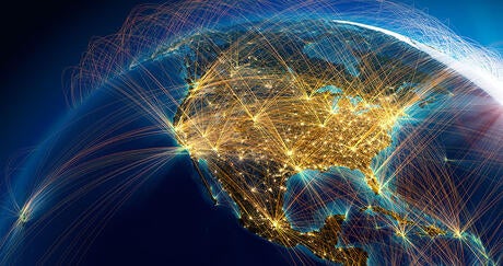 Planet Earth with detailed relief is covered with a complex luminous network of air routes based on real data thumbnail image