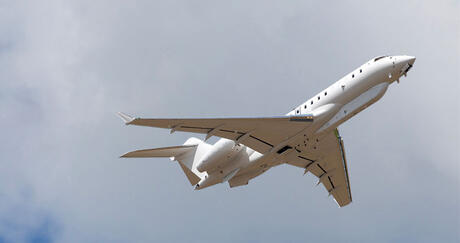L3Harris' Army’s Theater Level High-Altitude Expeditionary Next Airborne ISR Radar (ATHENA-R) program aircraft in flight with cloudy skies around it