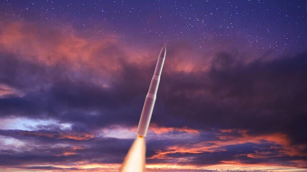Sentinel Missile flies through sunset sky
