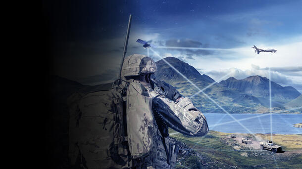 Soldier looks at battlefield with assets linked on network