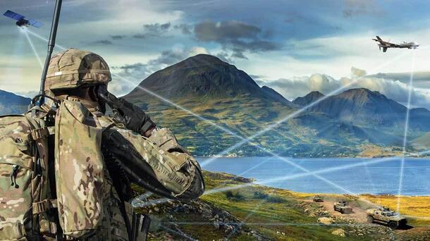 L3Harris radio on soldier in rocky terrain