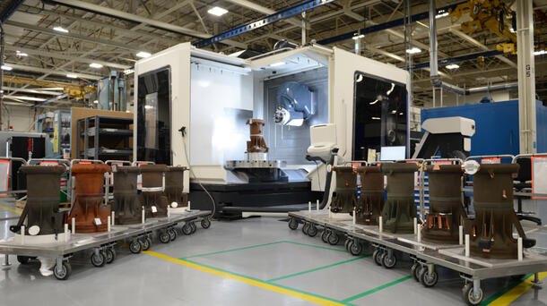 3D printed RL10 rocket engine combustion chambers shown in the manufacturing area at L3Harris’ facility in West Palm Beach, Florida.