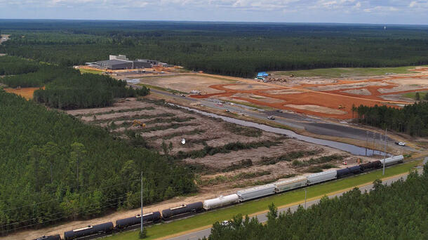 Construction crews continue work on expanding a facility in Arkansas