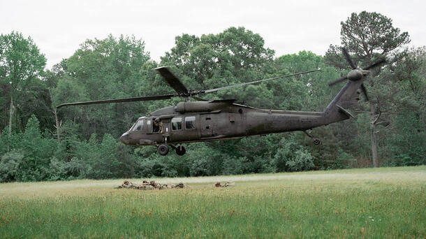 Soldiers board a UH-60 Black Hawk helicopter