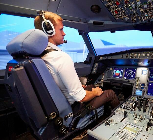 pilot in full flight simulator