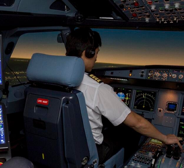 airbus pilot in full flight simulator