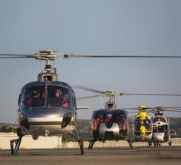Helicopters preparing for take off