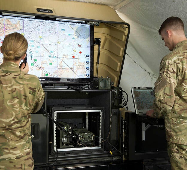Integrated tactical communication systems providing secure military communications capabilities