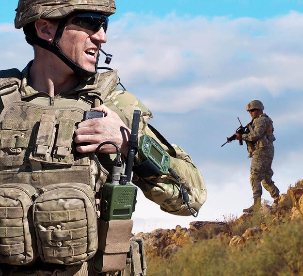 Soldier using Tactical Radio