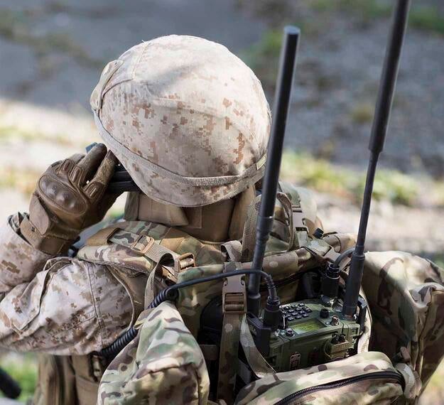 Soldier with Falcon® IV AN/PRC-158 Multi-channel Manpack Radio