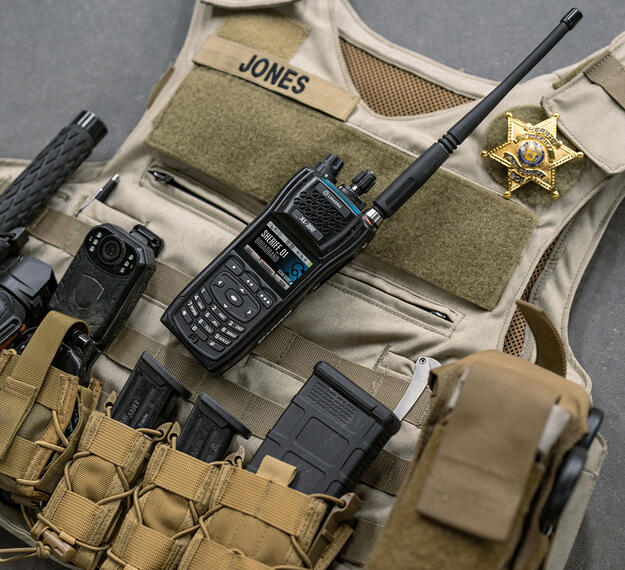 XL Converge™ 200P Multiband Portable Radio on sheriff's vest