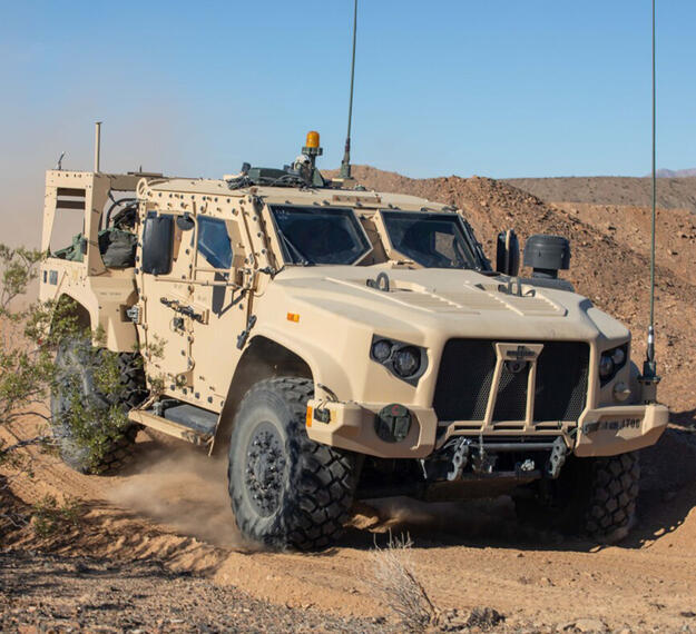U.S. Soldiers maneuver a Joint Light Tactical Vehicle (JLTV)
