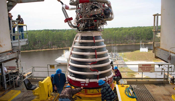 NASA Stennis teams conducted a successful lift onto the Fred Haise Test Stand of RS-25 engine No. E20001, the first of 24 new production engines. Photo credit: NASA Stennis.