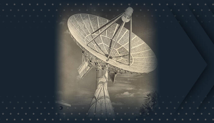 A really large antenna is aimed at the sky