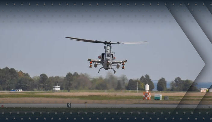 Attack helicopter lands at air field