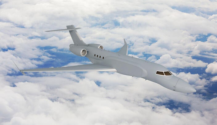 L3Harris' concept graphic of the right side, forward view of the AERIS X Bombardier Global 6500 Variant in flight with sky and cloud background