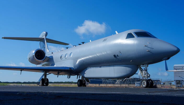 MC-55A Peregrine aircraft parked on tarmac