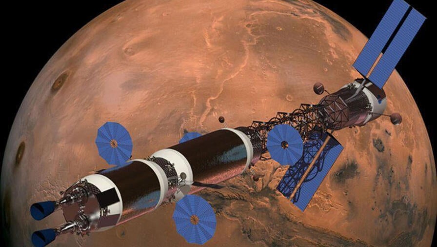 Artist rendering of  Nuclear Thermal Propulsion vehicle concept in front of the planet Mars