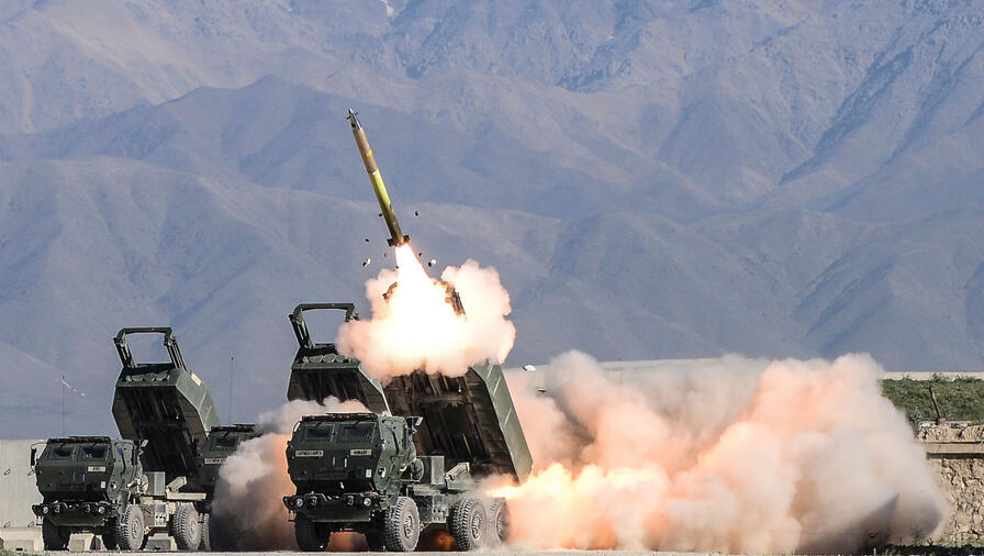 Rocket launches from launcher with mountains in background