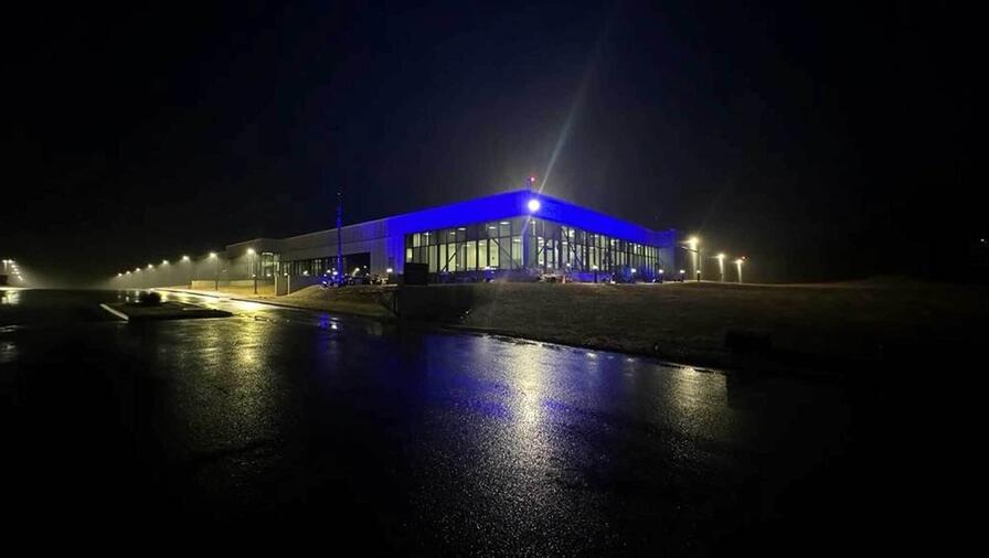 RCAF Blue Light Celebration with light on L3Harris facility