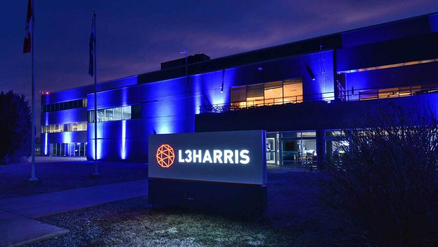 L3Harris in Mirabel celebrating the RCAF Centennial with blue lighting