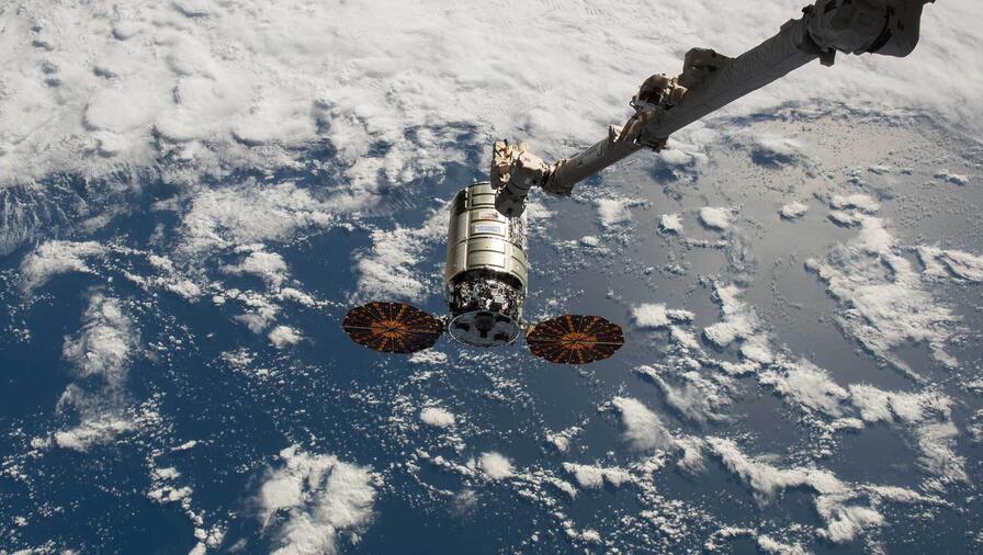 Cygnus space freighter approaches the space station