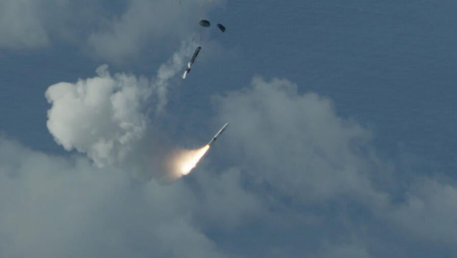 A Medium Range Ballistic Missile with a Hypersonic Target Vehicle (HTV) - 1 front end is air launched from a C-17 aircraft off the coast of the Pacific Missile Range Facility, Hawaii, during Flight Test Other-40, or FTX-40. Photo Credit: MDA.
