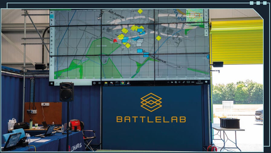 Large common operational picture showing on big screen at the Battlelab in Dorset