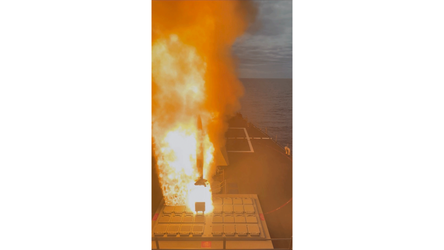 The Arleigh Burke-class guided-missile destroyer USS Shoup (DDG 86) fires an SM-2 missile during a tactical training exercise. (U.S. Navy Photo).